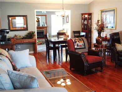 Living Rm. with beautiful hardwood floors.