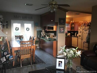 DINING ROOM AND VIEW OF THE KITCHEN