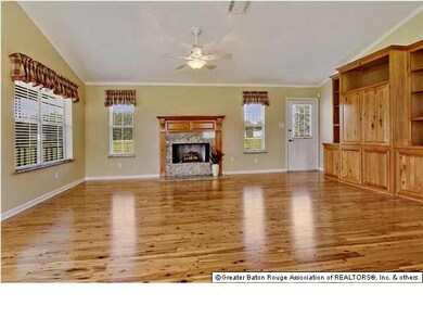 Wood burning fireplace with Louisiana Cypress mant