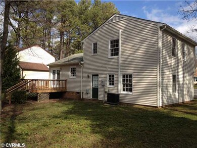 Exterior Back - Rear deck and backyard great for e