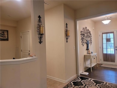 Foyer with baseboards