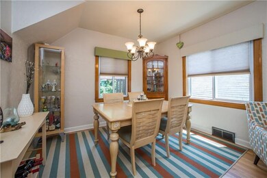 Lovely dining space with a built in corner cabinet