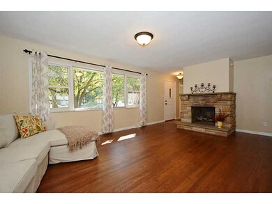 Living Room. Large picture window frames the livin