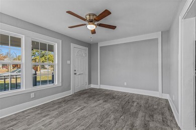 Empty room featuring wood-type flooring and ceilin