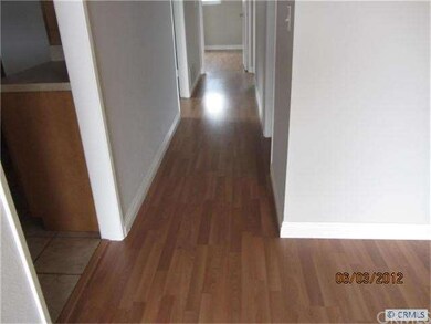 Laminate flooring throughout