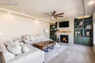 Carpeted living room featuring recessed lighting, 