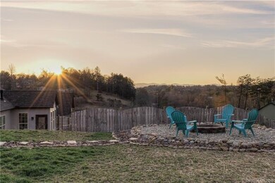 Landscaped firepit  offers outdoor living with lon