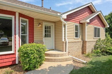 Brick accented front and steps with the BONUS of a brand new roof, fascia & gutters in 2023!