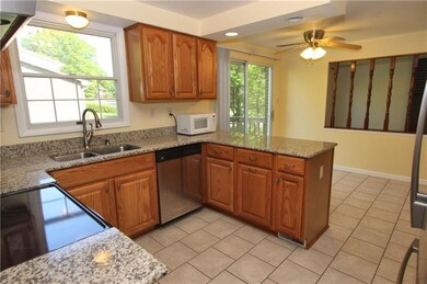 Kitchen, stainless appliances and granite countert