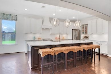 Gourmet kitchen with sleek granite counters, stain