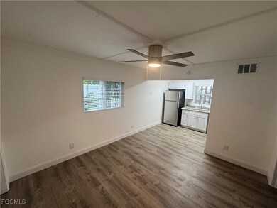 Natural light, new ceiling fan, and wood finished