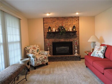 Family room with gas fireplace, recessed lighting,