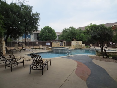 View of swimming pool featuring a patio area, a po