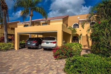 View of vehicle parking featuring a carport