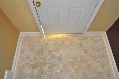 Travertine foyer flooring