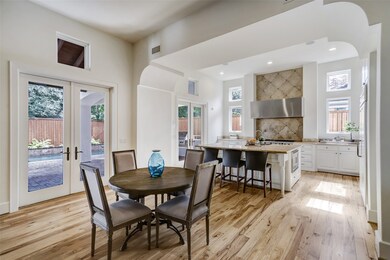 Open concept den, breakfast and kitchen area, buil