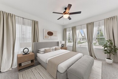 Bedroom featuring carpet floors and ceiling fan