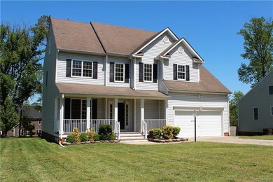 Your new home features a front porch and double wi