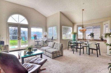 Vaulted high ceilings and numerous windows let in 