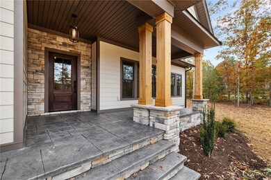 Doorway to property with covered porch