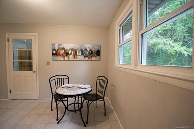 Double hung windows everywhere.  Eat-in kitchen