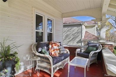 Wooden deck featuring an outdoor living space
