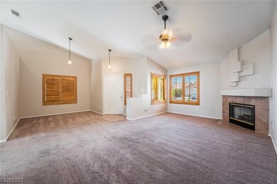 Living Room & Possible Den/Bar Area
