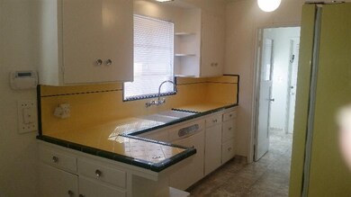 Original kitchen w/new paint and flooring