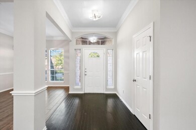 View of the front entry from the formal living sho