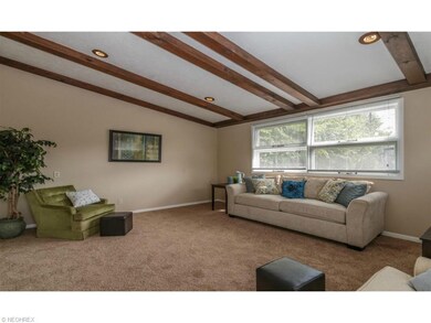 17x13 Family room with plenty of natural light.
