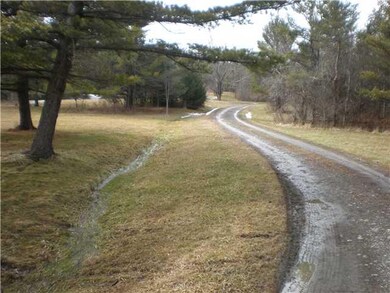 Other. The home sits on a private 6.5 acre partial