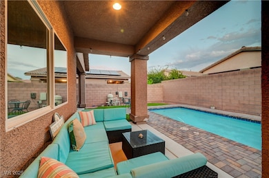 Fenced backyard featuring an outdoor hangout area