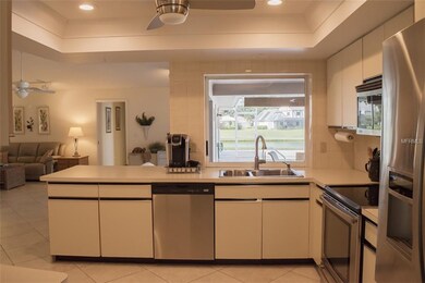 stainless steel appliances, view to the patio and 