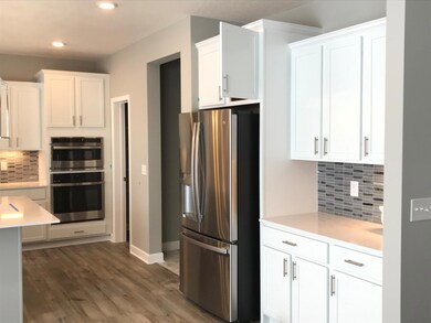 Love the area for the coffee bar and the soft close cabinets!.jpg