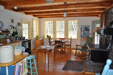 Kitchen with Dining Room area.