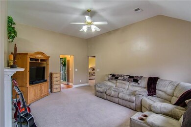 Open floor plan with a little separation from the kitchen so not everybody has to watch you cook!