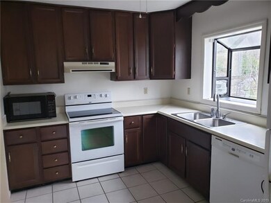 Right side of Kitchen (Large Pantry and Laundry to