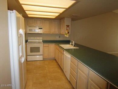 KITCHEN OPEN TO FAMILY ROOM