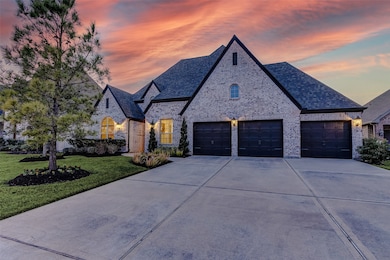 This one-story home has a 4-car tandem garage, with 3 independent doors, to easily store your four favorite possessions from trucks to sedans.