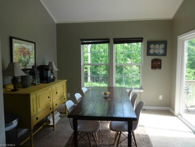 Morning room with slider to 2-tired deck.