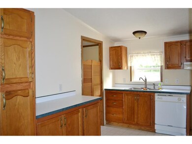 Honey-oak finished cabinetry offers warmth to the 