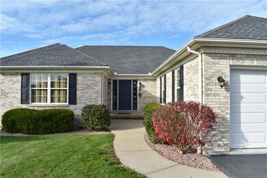 Closer view of front entry. Clean landscape and ve