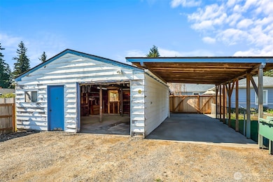 Detached Garage with 2 attached carports