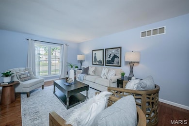 Living room featuring wood finished floors