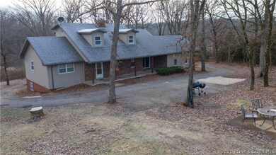 Driveway circles the home