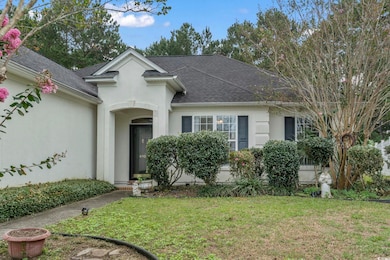 View of front of house featuring a front lawn