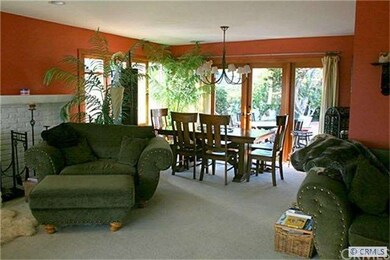 Dining Room with French Doors leading to Back Pati