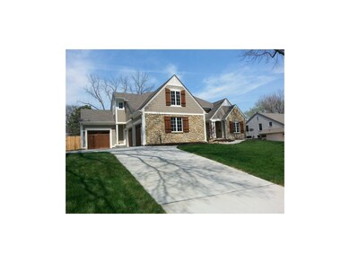 A Beautiful 1.5 Story with a 3 car garage.