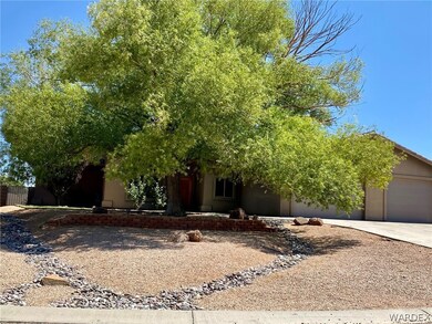 LARGE MATURE TREE AND LANDSCAPED FRONT YARD