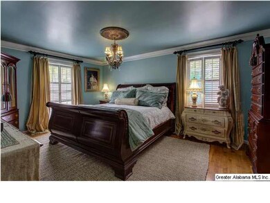 Very large master with crown molding , hardwood fl